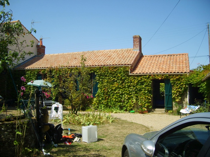 Surélévation d'une maison et construction d'un garage